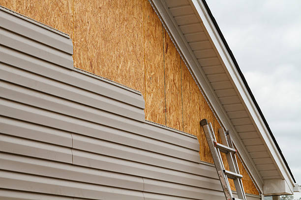 Professional Siding Contractor technician working in Sidman, PA
